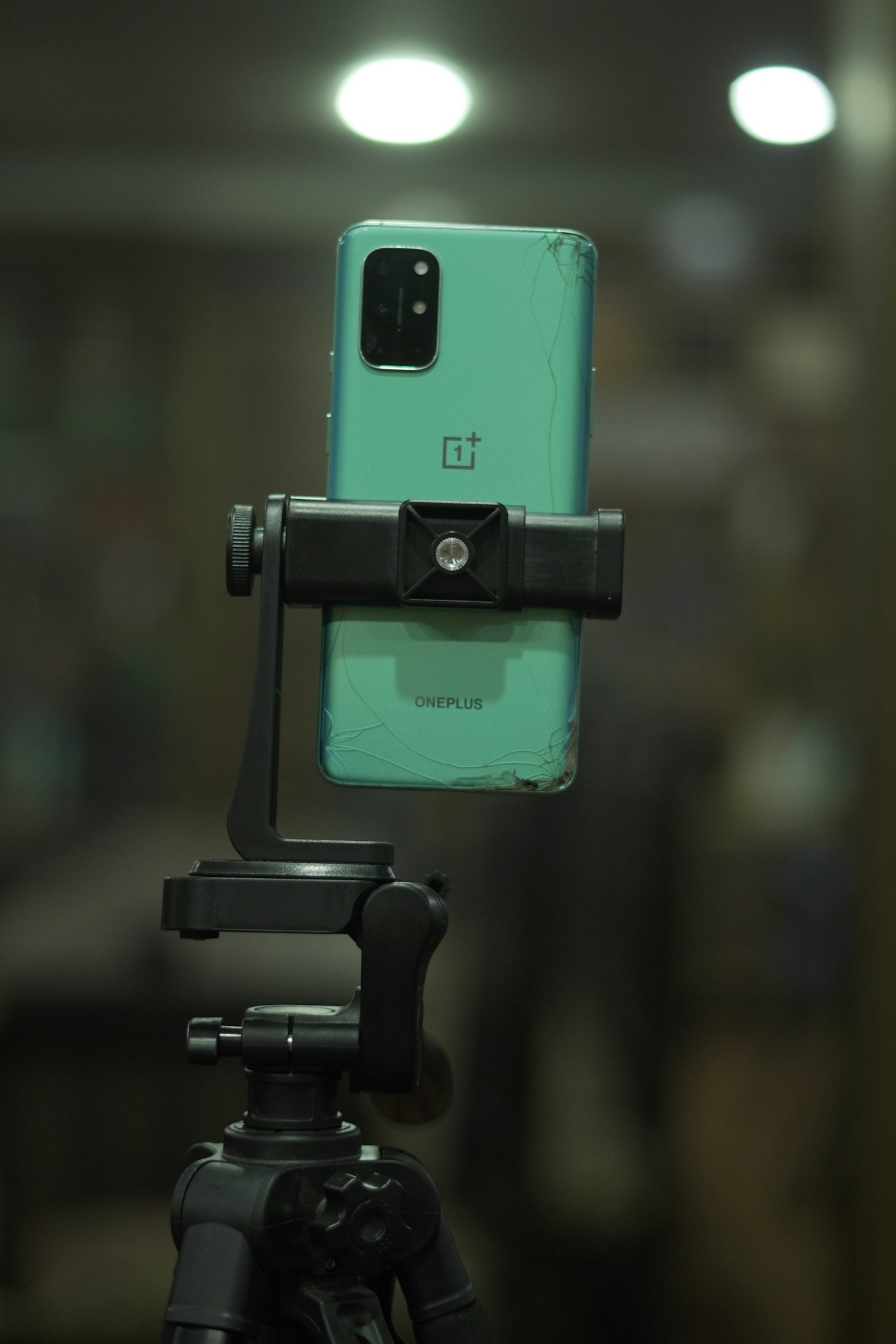 A smartphone mounted on a tripod